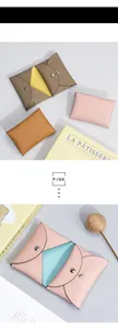 Detailed views of leather card wallets with metal snap closure and interior color contrast