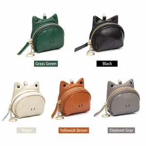 Cinque portamonete in pelle a forma di gatto in vari colori con portachiavi in metallo