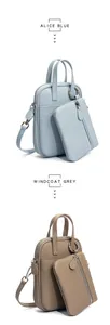 Detailed view of leather crossbody bags in Alice Blue and Windcoat Grey with mini pouches