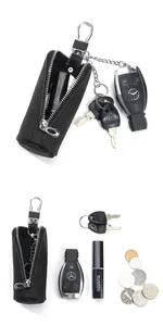 Detail of lychee pattern leather car key case with metal zipper and spring hook