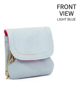 Close-up of light blue leather coin purse with rainbow stitching and gold chain detail