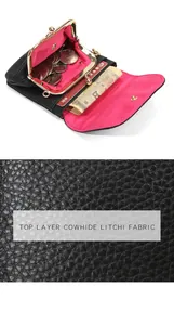 Macro view of black top layer cowhide texture and pink fabric lining inside the coin purse