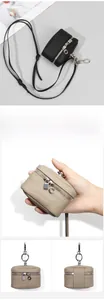 Detailed views of elephant gray pebble leather mini coin purse with silver hardware