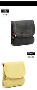 Detail of mini leather coin purses with rainbow stitching and golden chain straps