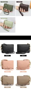 Detailed view of lychee grain leather wallets with wristlets and snap button pockets