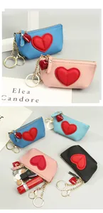Macro shot of colorful leather coin purses showing storage for coins, keys and lipstick