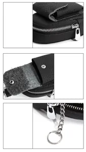 Dettagli macro di una mini borsa in pelle nera con cerniera in metallo e bottone a pressione