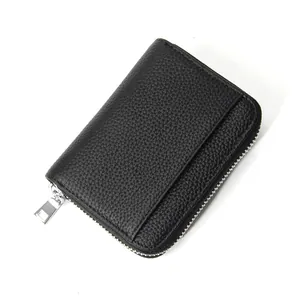 Cartera de mujer en cuero granulado negro con protección RFID y cremallera plateada elegante