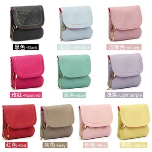 Genuine leather mini coin purse with chain strap in ten vibrant colors for women