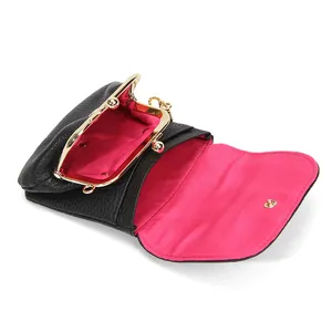 Genuine black leather mini coin purse with pink lining and gold chain strap