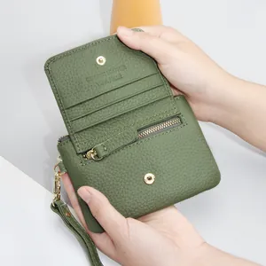 Dark green pebble grain genuine leather mini wallet with wristlet and snap closure