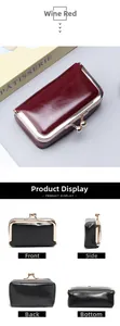 Detail view of vintage gloss leather kiss-lock mini bags in burgundy and black finishes
