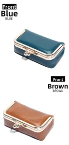 Front view of vintage oil wax leather kiss-lock mini bags in blue and brown colors