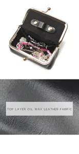 Macro shot of oil wax leather texture and interior storage of a mini jewelry pouch