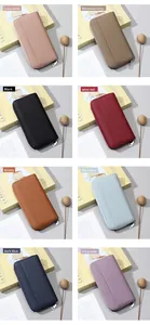 Portafoglio lungo in pelle RFID mostrato in otto varianti di colore con trama litchi