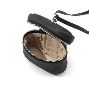 Minimalist black lychee pattern leather mini coin purse with adjustable strap