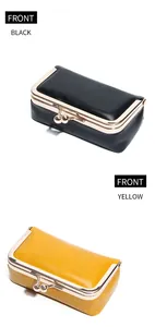 Front view of vintage oil wax leather mini jewelry bags in black and yellow colors