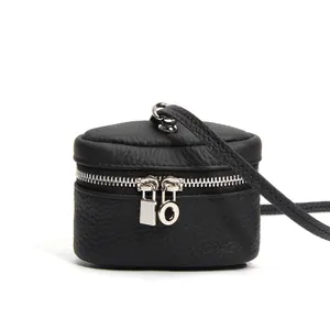 Minimalist black lychee leather mini crossbody coin purse with silver hardware for women