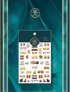 Macro detail of 5D dessert relief nail stickers featuring 3D chocolate and cookie patterns