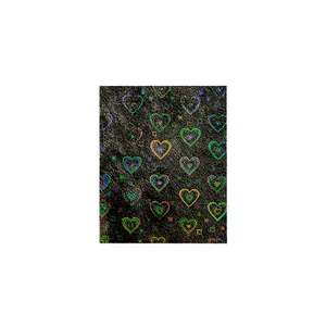 Holographic heart pattern nail stickers with laser effect on black textured surface
