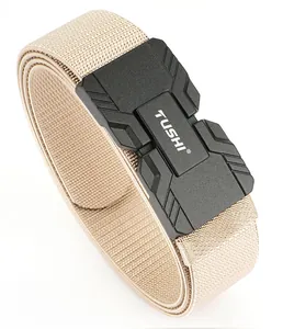 Close-up of khaki tactical nylon belt showing magnetic quick release buckle and durable texture