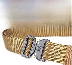 Close-up of quick release alloy buckle on khaki nylon tactical belt with metal hardware