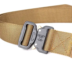 Detailed view of quick-release metal buckle on coyote brown tactical nylon web belt