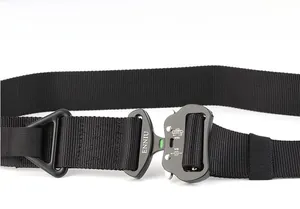 Detail of the tactical belt showing the ENNIU quick-release buckle and nylon webbing