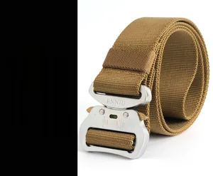 Close-up of tan nylon tactical belt with a quick-release silver alloy buckle