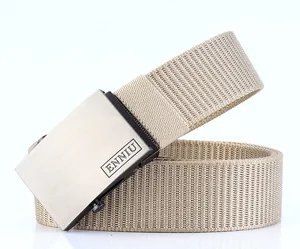 Detail shot of khaki nylon tactical belt with matte metal buckle and woven texture