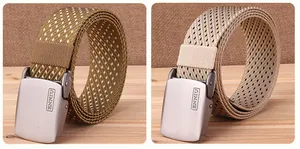 Detail of woven tactical belts with frosted metal buckles and snowflake pattern texture