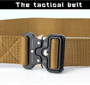 Detail of a tactical belt showing heavy-duty metal quick release buckle and nylon texture