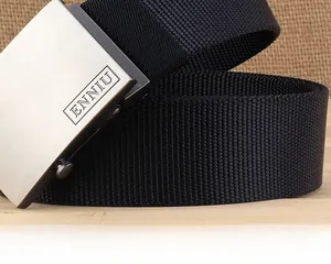 Detail of matte silver metal buckle with logo on thick black nylon tactical belt