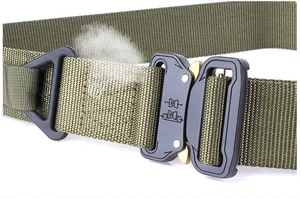 Detail of army green nylon tactical belt featuring a heavy-duty quick release metal buckle