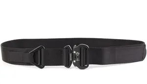 Detail of matte black tactical buckle with D-ring and durable nylon webbing strap