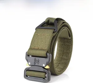 Detail of olive nylon tactical belt with heavy-duty quick-release metal buckle and D-ring
