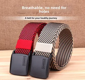 Detail of breathable nylon tactical belts with YKK buckles on a rustic wooden background