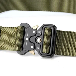 Macro detail of military olive green tactical belt with metal quick-release buckle