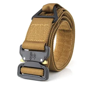 Tactical nylon belt detail with quick-release metal buckle and heavy-duty D-ring