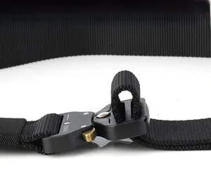Close-up of tactical nylon belt with metal quick-release buckle and adjustment feature