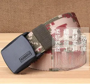 Close-up of tactical nylon camouflage belt with matte black smooth quick-release buckle