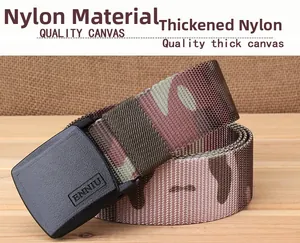 Detail of camouflaged nylon belt featuring an ENNIU engraved plastic buckle on wood