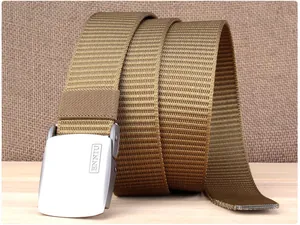 Macro shot of durable khaki nylon tactical belt with a polished silver alloy buckle