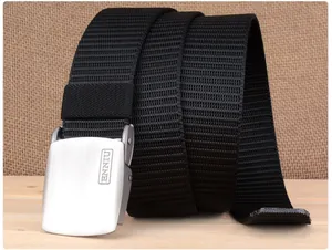 Detail of black nylon woven tactical belt with brushed metal buckle and ENNIU engraving