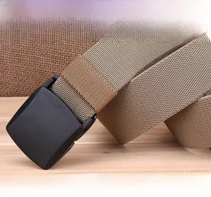 Close-up of khaki woven nylon belt featuring a durable black YKK plastic buckle