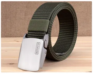 Close-up of olive green tactical nylon belt with brushed silver metal buckle and engraving