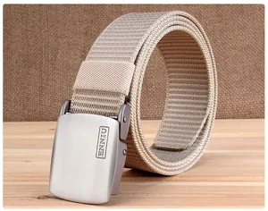 Close-up of beige nylon tactical belt with brushed metal buckle showing ENNIU logo