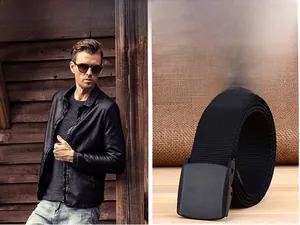 Detail of durable nylon canvas sports belt with matte YKK buckle on male model