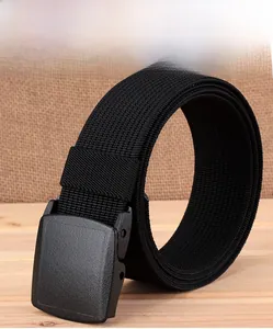Close-up of thick nylon woven belt with a matte black plastic buckle for outdoor travel