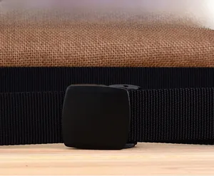 Close-up of a durable black nylon tactical belt featuring a matte black square YKK buckle